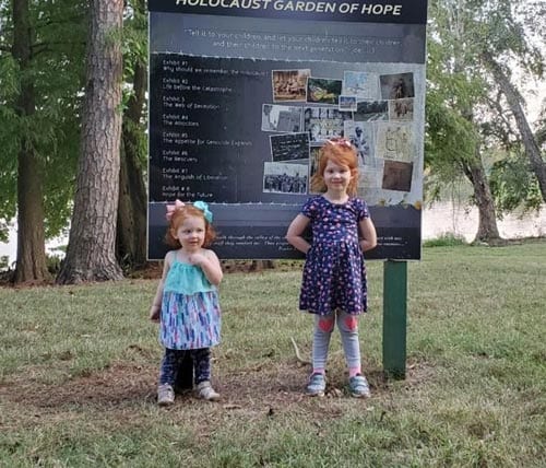 Decorating stones to remember murdered children